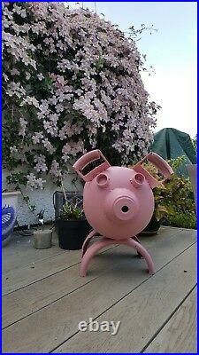 Charcoal barbeque grill, pink piggie