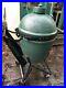 Large_Big_Green_Egg_barbeque_grill_with_integrated_nest_handler_01_zpj